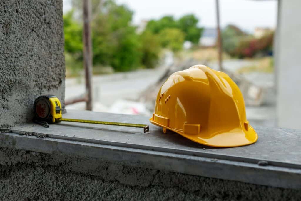 A construction hat in a site - construction marketing agency